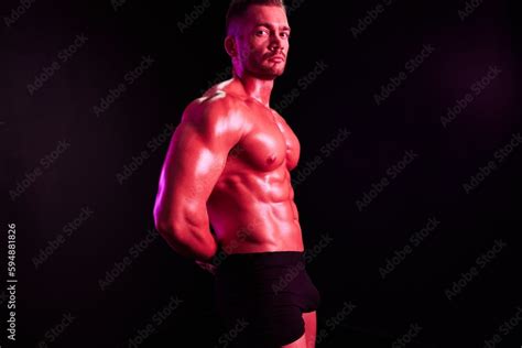 Man Professional Athlete With Naked Torso In Sports Uniform Isolated