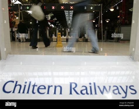 Passengers Walk Through The Concourse At Marylebone Station In London