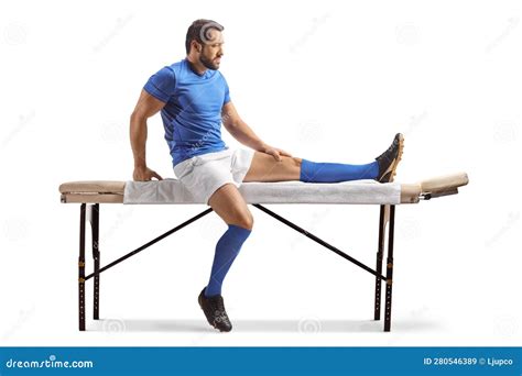 Football Player Sitting On A Massage Bed Stock Image Image Of Condition Athlete 280546389