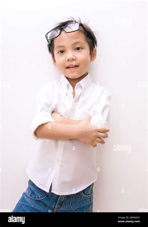 White Shirt On Little Smart Asian Boy Stock Photo Alamy