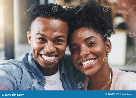 When Youre in Love Youve Gotta Take a Selfie. a Happy Young Couple ...