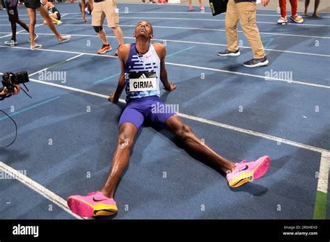 Lamecha Girma Of Ethiopia Sits Down On The Track After Winning The