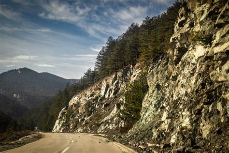 Asphalt Mountain Road at Sunset with Beautiful Nature, Stones and ...