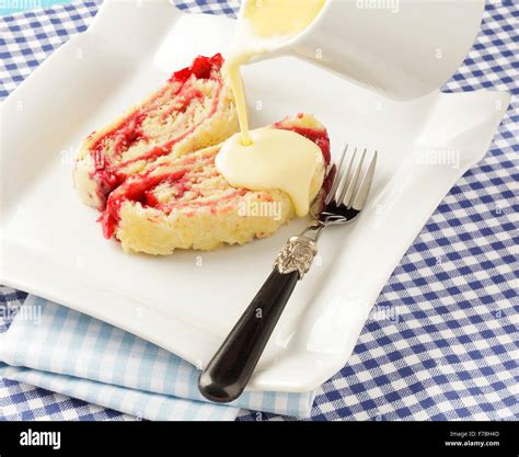 Jam Roly Poly and custard Stock Photo - Alamy