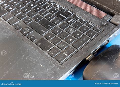 Close Up On Dirty And Unhygienic Computer Laptop Keyboard Full Of Dust