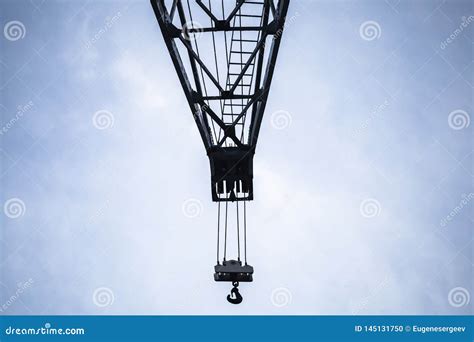 Crane Boom With Hook Under Blue Sky Stock Photo Image Of Load