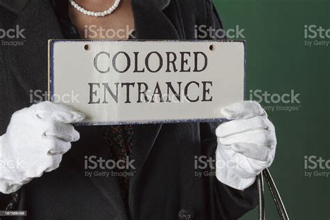 Hands Holding Colored Entrance Sign From The American Fifties Stock