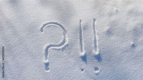 Question Mark And Exclamation Mark On Snowy Surface Close Up Copy