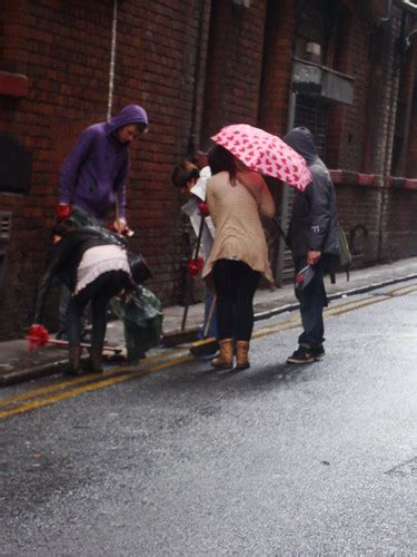 Dsc Cleaning Up Broken Glass In The Rain Miss Bowen Flickr