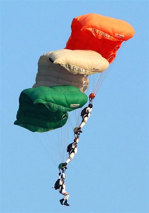 Members of Indian Air Force skydiving team 'Akash Ganga' perform.