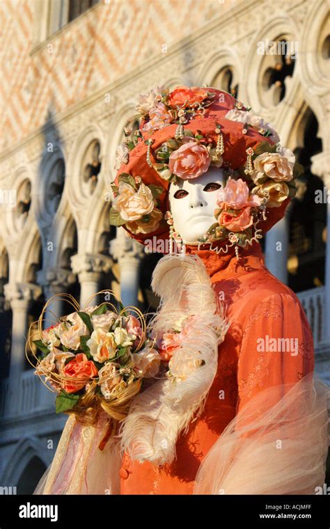 masked costume character posing in front of Doge s Palace Venice Carnival Stock Photo - Alamy