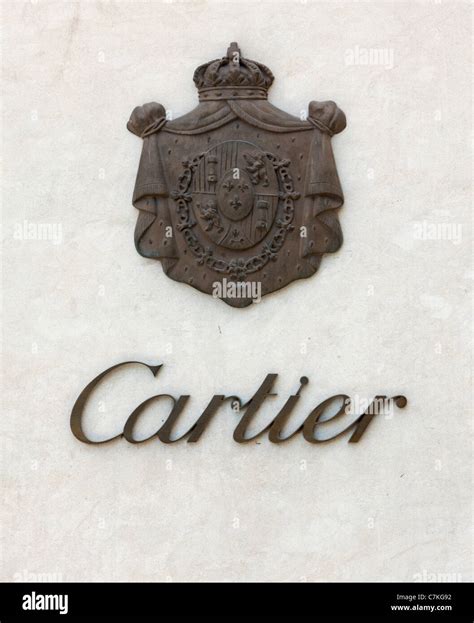 Cartier signage and coat of arms on wall Stock Photo - Alamy