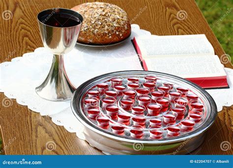 Silver Communion Cups, Bread and Bible. Stock Image - Image of agape ...