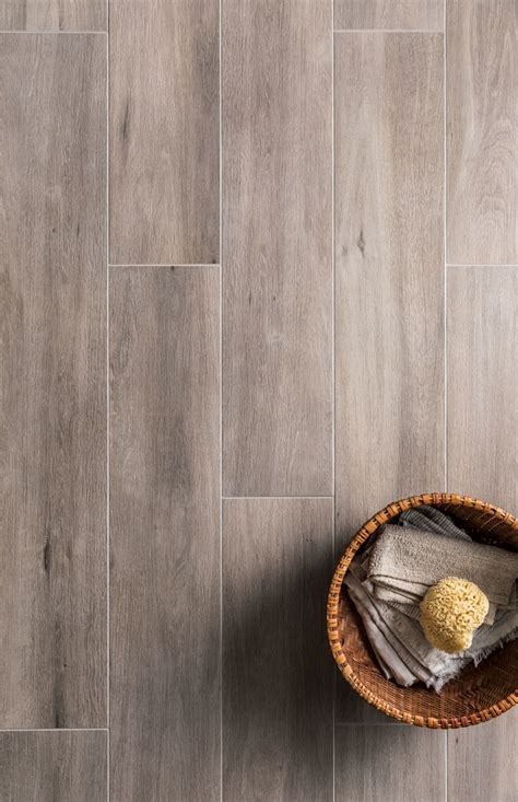 Nomad Grey Porcelain Wood Effect Tiles | Mandarin stone, Wood effect tiles, Gray porcelain tile