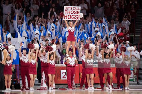 Cheerleaders of the Arkansas Razorbacks performs during a game... News ...