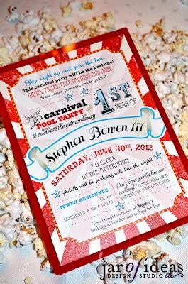 A Red And White Ticket Sitting On Top Of A Table Next To Some Popcorns