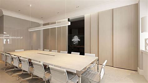 An Empty Conference Room With White Chairs And A Large Table In The