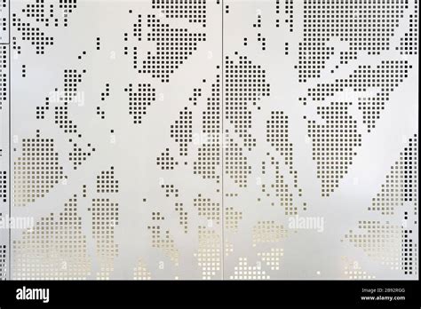 White Perforated Metal Panel with an Abstract Square Pattern ...