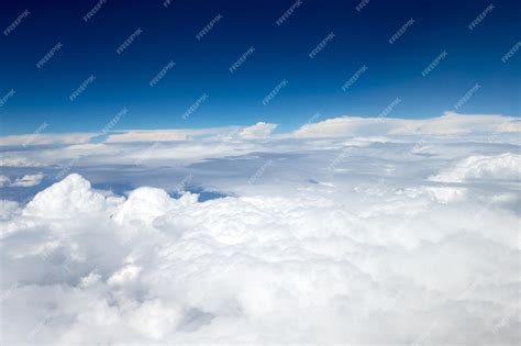 Premium Photo | Clouds a view from airplane window