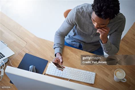 Distracted In The Office High Res Stock Photo Getty Images