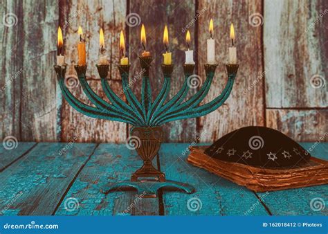 Closeup Of A Burning Chanukah Candlestick With Candles Menorah Stock