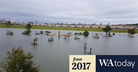 Near-record downpour causes flooding across Perth