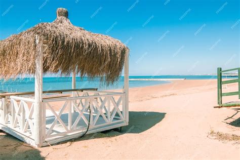 Premium Photo Massage Huts With Thatched Roof On Sand Beach Along