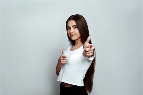 Premium Photo | Portrait of a girl smiling on a white background