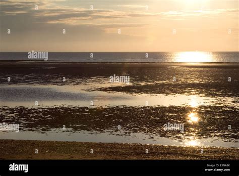 Sunset Over The Wash Hunstanton Norfolk Stock Photo Alamy