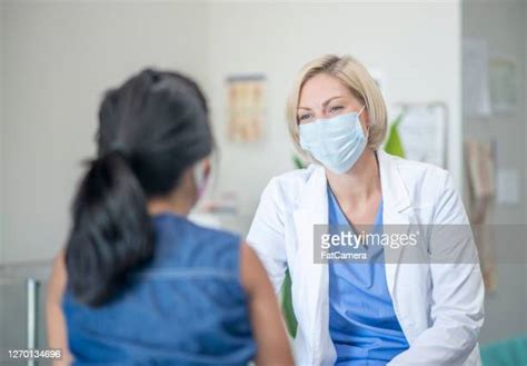 Nurse And Female Patient Masks ストックフォトと画像 Getty Images