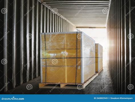 Packaging Boxes Stacked On Pallets Inside Cargo Container Shipment