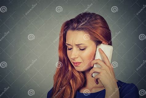 Girl On The Phone With Headache Upset Unhappy Female Talking On Phone