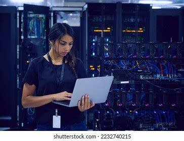 Female Technician Using Laptop Server Room Stock Photo 2232740215