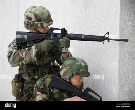 Soldiers Aiming Weapons Stock Photo Alamy