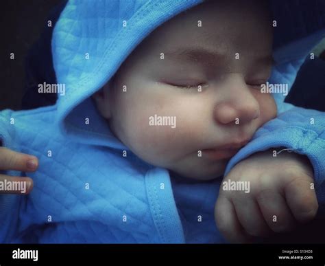 Newborn baby boy sleeping Stock Photo - Alamy