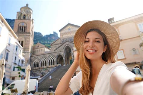 Happy Young Beautiful Tourist Girl Taking A Selfie Smiling At The