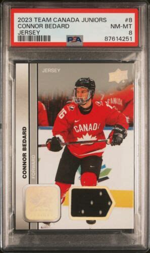 2023 UPPER DECK TEAM CANADA JUNIORS JERSEYS 8 CONNOR BEDARD PSA NM MT