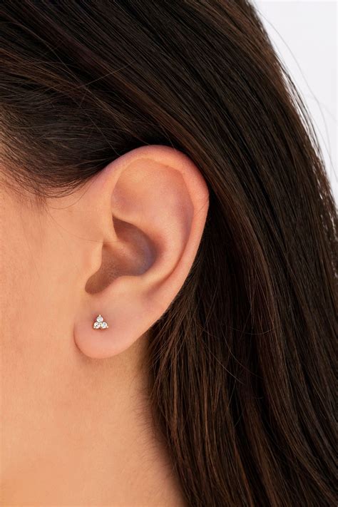 The Trillium Are Dainty Stud Earrings Formed By Three Cubic Zirconia