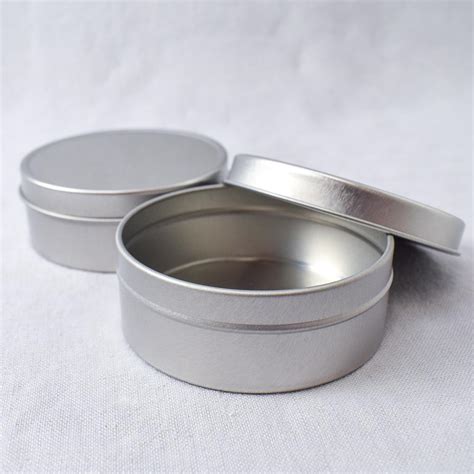 large circular tin  babs