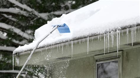 How To Safely Remove Snow From Your Roof Iron River Construction