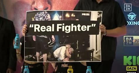 Logan Paul Trolls Dillon Danis With Poster Of Him Getting Choked Out By Security Guard