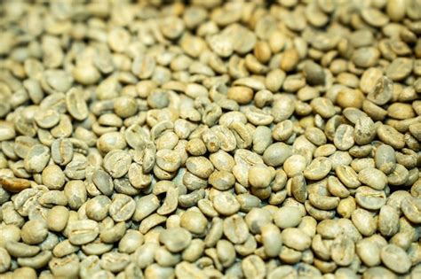 Premium Photo Unroasted Green Arabica Raw Coffee Beans Background