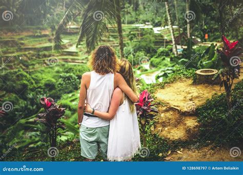 Young Honeymoon Couple On Rice Fields Of Bali Island Travel Vacation On Bali Concept Stock