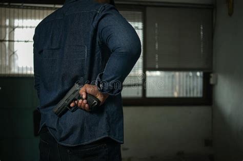 Man Gun Behind His Back Stock Photos Free Royalty Free Stock