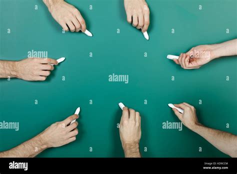 Hand Holding Chalk Writing On Green Blackboard Stock Photo Alamy