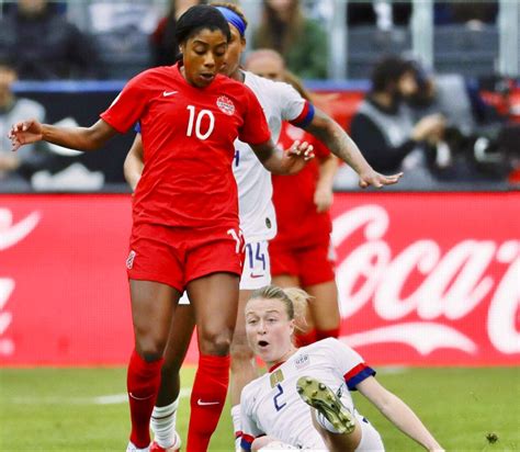 Ashley Lawrence 10 Of Canada And Emily Sonnett 2 Of USA CONCACAF