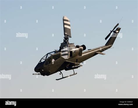 Vietnam War era helicopter in flight AH-1 Cobra Stock Photo - Alamy