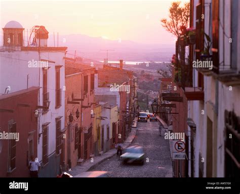 city street in San Miguel de Allende at sunset Stock Photo - Alamy