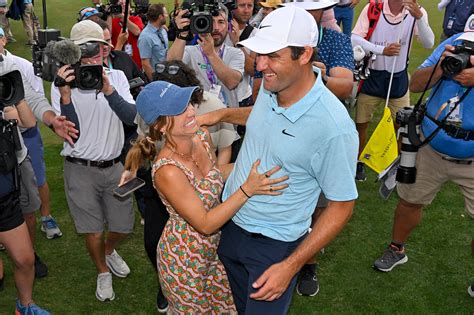 Scottie Scheffler hugs wife Meredith after Players Championship win