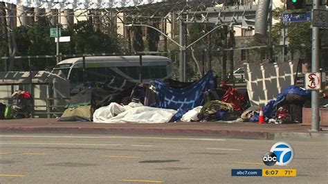 LA to consider allowing homeless to keep some possessions during ...